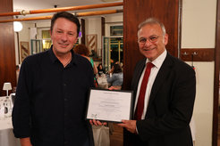 Dr. Istvan Ballai, President of the Solar Physics Division of the European Physical Society (left), presents the Zdenĕk Švetska Senior Prize to Prof. Dr. Sami K. Solanki (right).